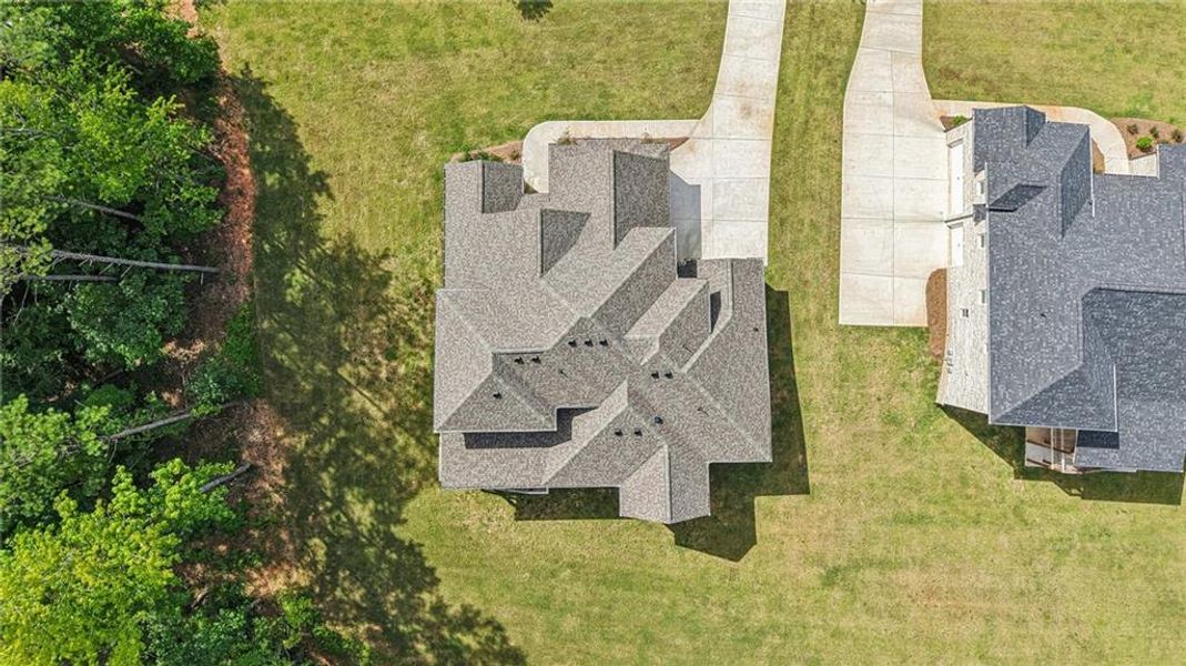 Front exterior of a new home in , Douglasville, GA, highlighting curb appeal (Image 26).