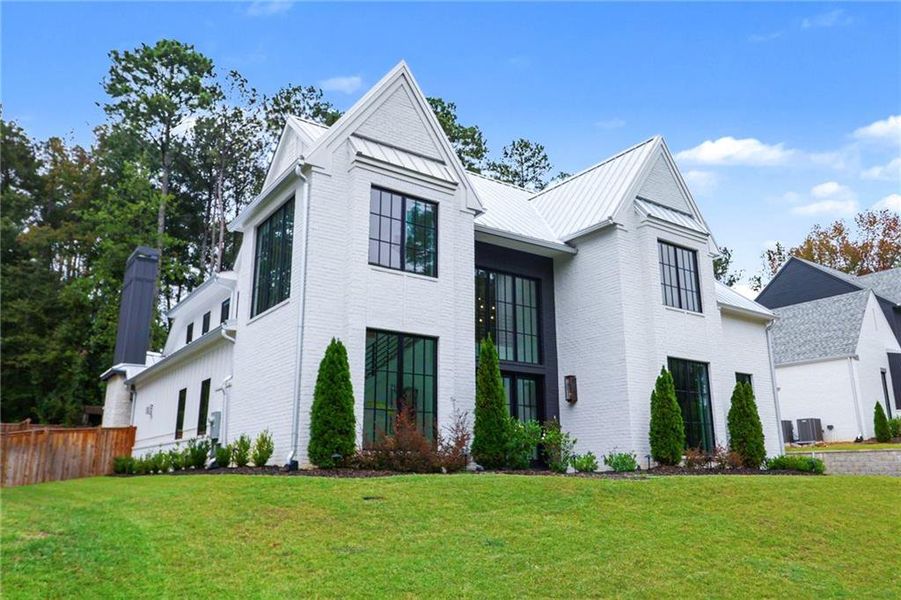 Front exterior of a new home in , Alpharetta, GA, highlighting curb appeal (Image 26).
