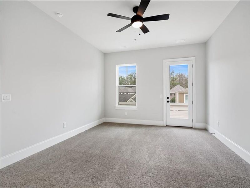 Spacious, unfurnished interior of a new home in The Village at Towne Lake, Woodstock (Image 68).