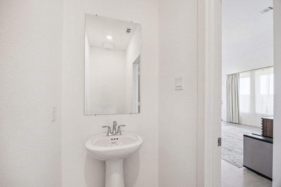 Half bath located on the first floor