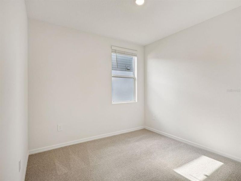 Spacious, unfurnished interior of a new home in The Reserve at Van Oaks, Auburndale (Image 19).
