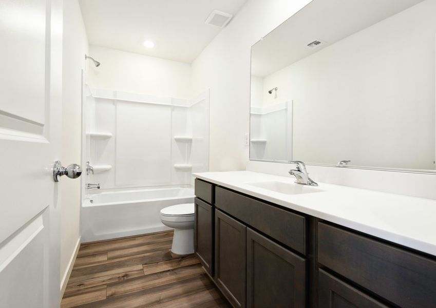 Spacious countertops make getting ready easy.