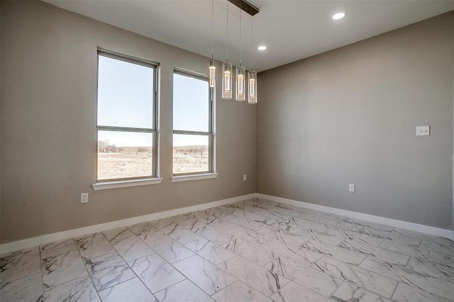 Empty room featuring a wealth of natural light