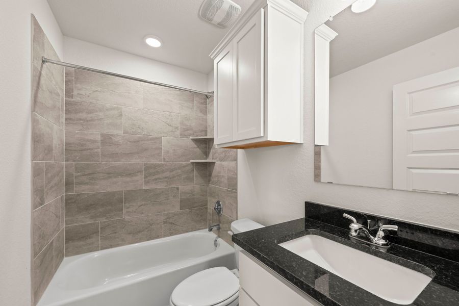 Furnished interior view inside a new home in Rancho San Gabriel, Georgetown (Image 9).