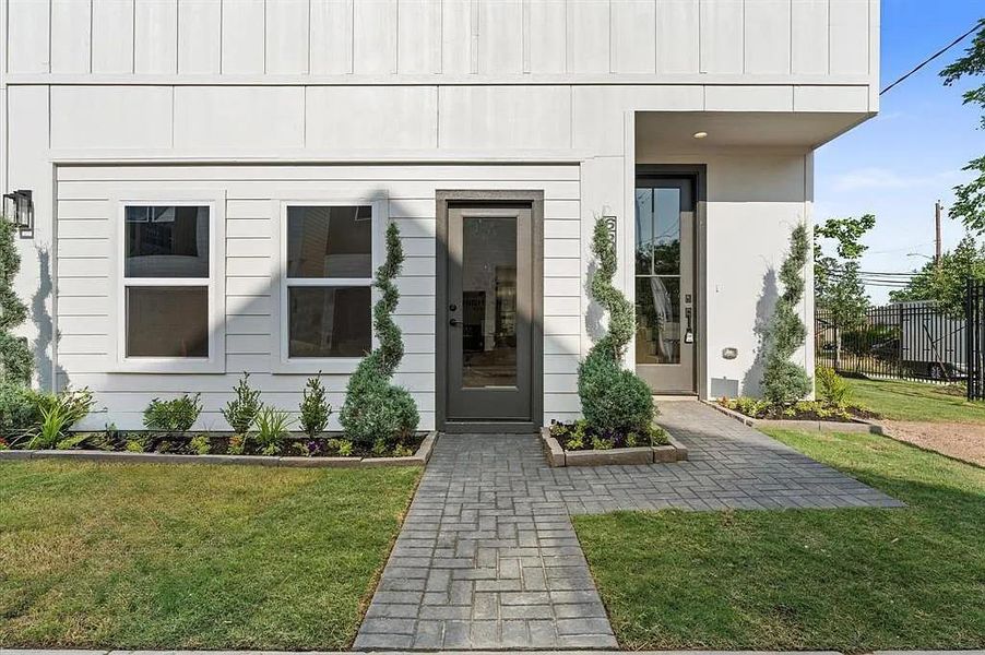 Front exterior of a new home in Highland Gardens, Houston, TX, highlighting curb appeal (Image 5). Front exterior of a new home in Highland Gardens, Houston, TX, highlighting curb appeal (Image 5).