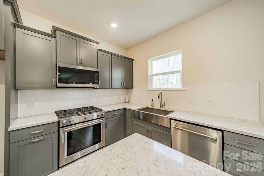 Furnished interior view inside a new home in Stewarts Landing, Charlotte (Image 8).