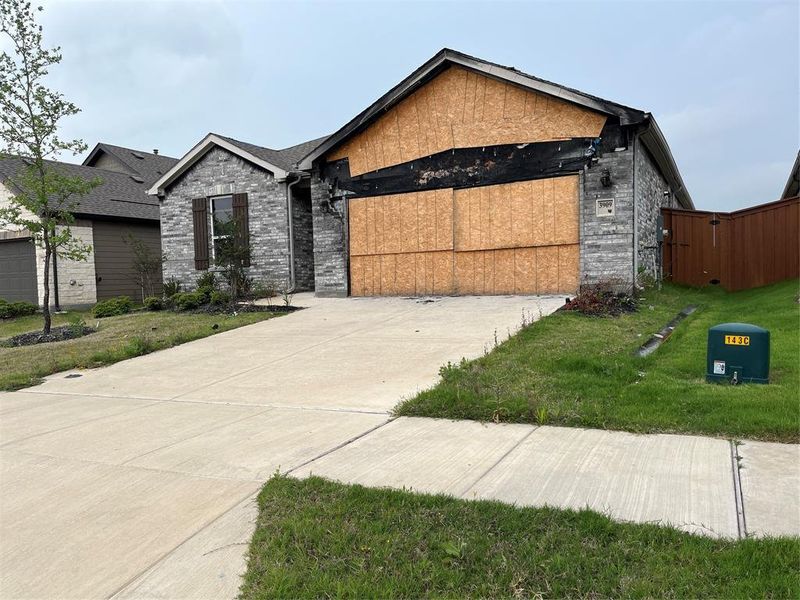 Front exterior of a new home in , Crandall, TX, highlighting curb appeal (Image 5).