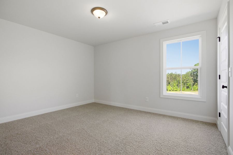 Spacious, unfurnished interior of a new home in Cherokee Knoll, Williamston (Image 31).