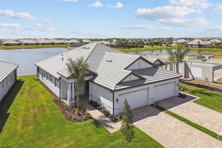 Front exterior of a new home in Sweetwater at Lakewood Ranch, Lakewood Ranch, FL, highlighting curb appeal (Image 2).