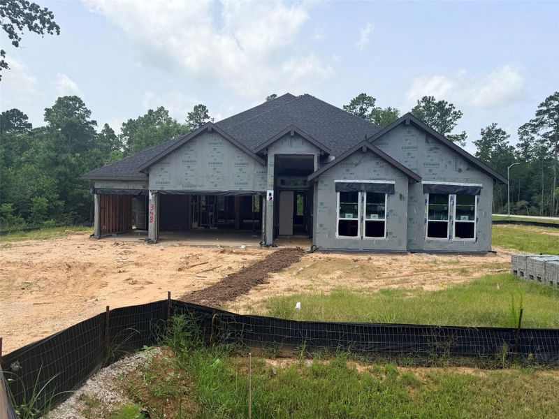 In-progress construction of a new home in Butlers Bend Estates, Pinehurst, TX (Image 21).