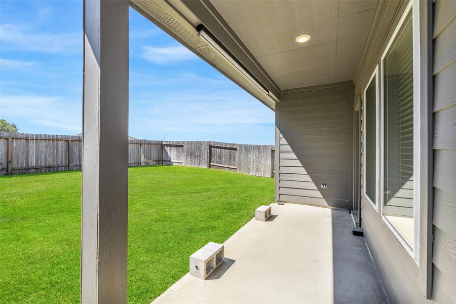 Exterior details and patio area of a home in Breckenridge Forest, Spring (Image 22). Exterior details and patio area of a home in Breckenridge Forest, Spring (Image 22).