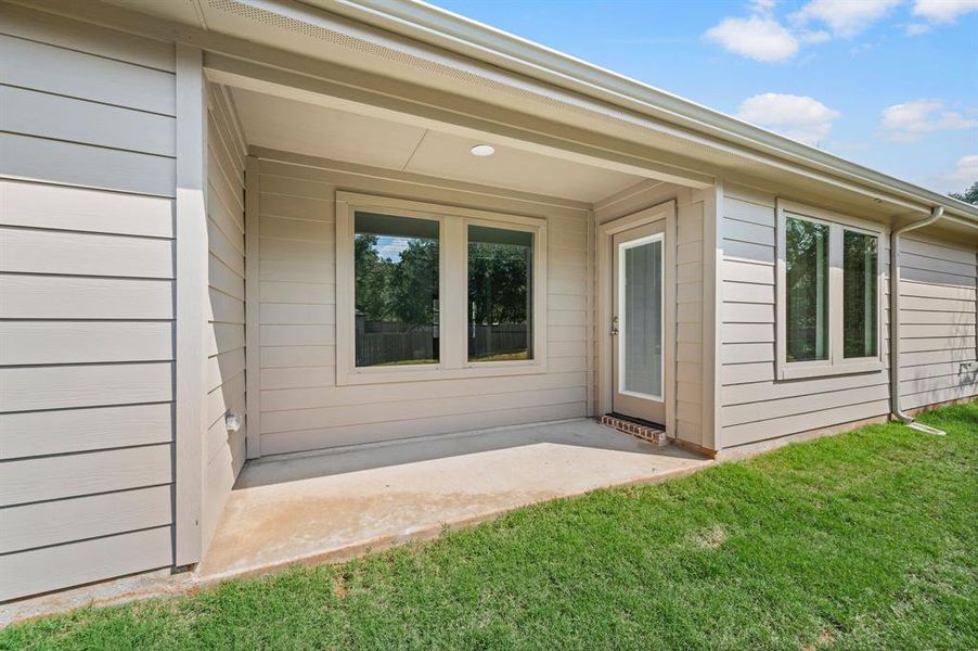 Exterior details and patio area of a home in Runaway Bay, Runaway Bay (Image 24).
