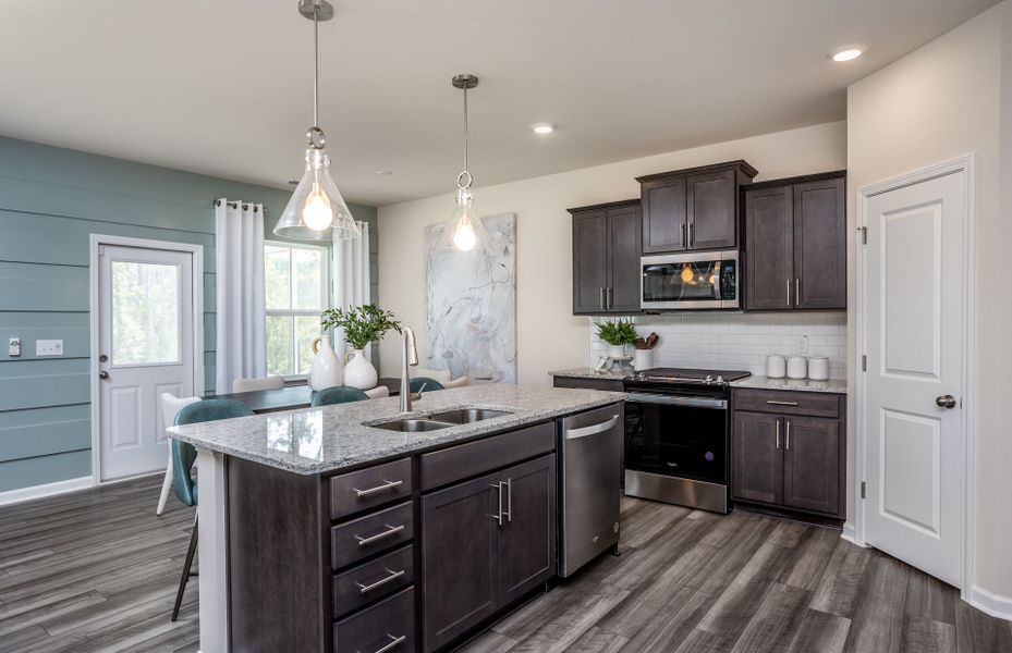 Furnished interior view inside a new home in Exchange at 401, Raleigh (Image 6).