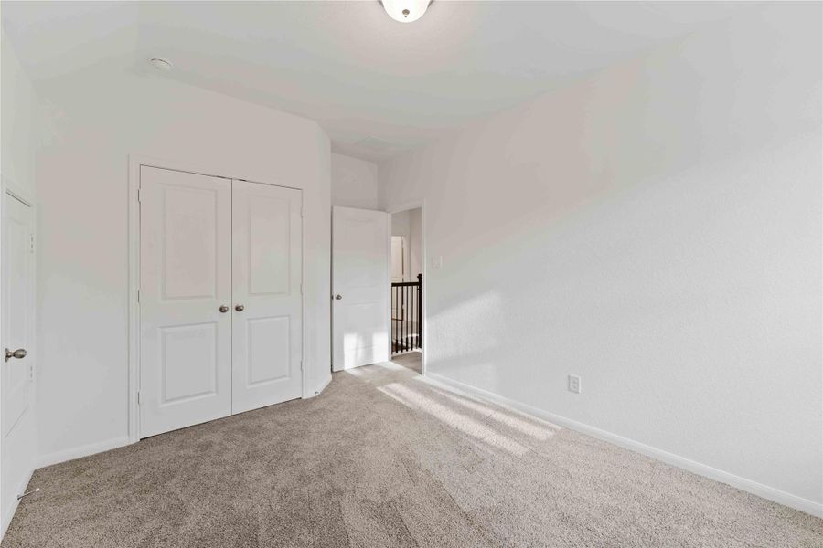 Spacious, unfurnished interior of a new home in Sunterra, Katy (Image 24).