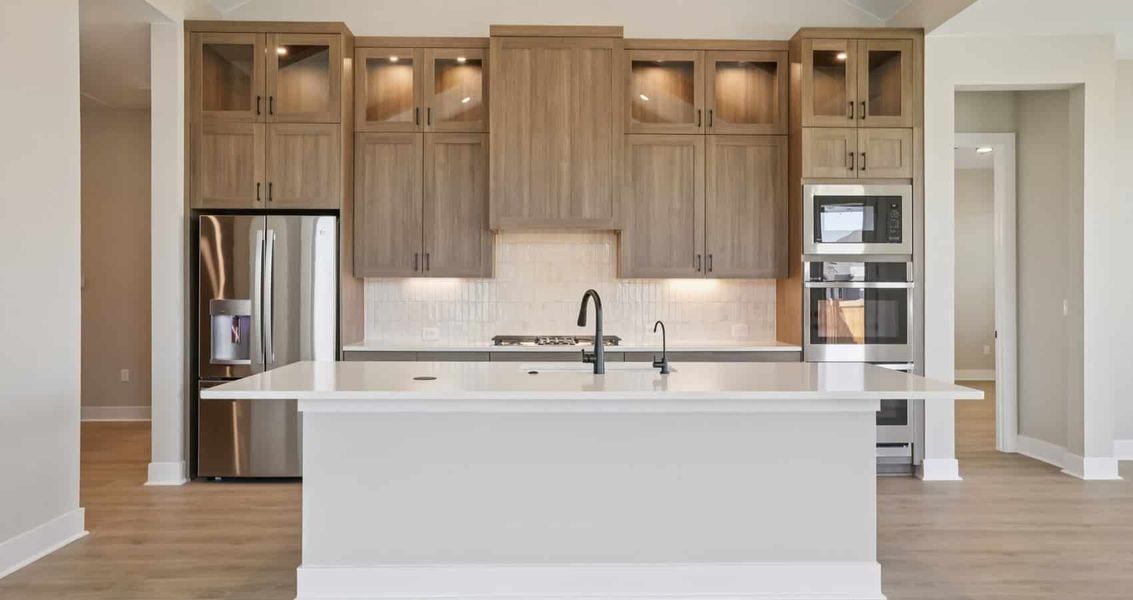 Furnished interior view inside a new home in 6 Creeks, Kyle (Image 8).