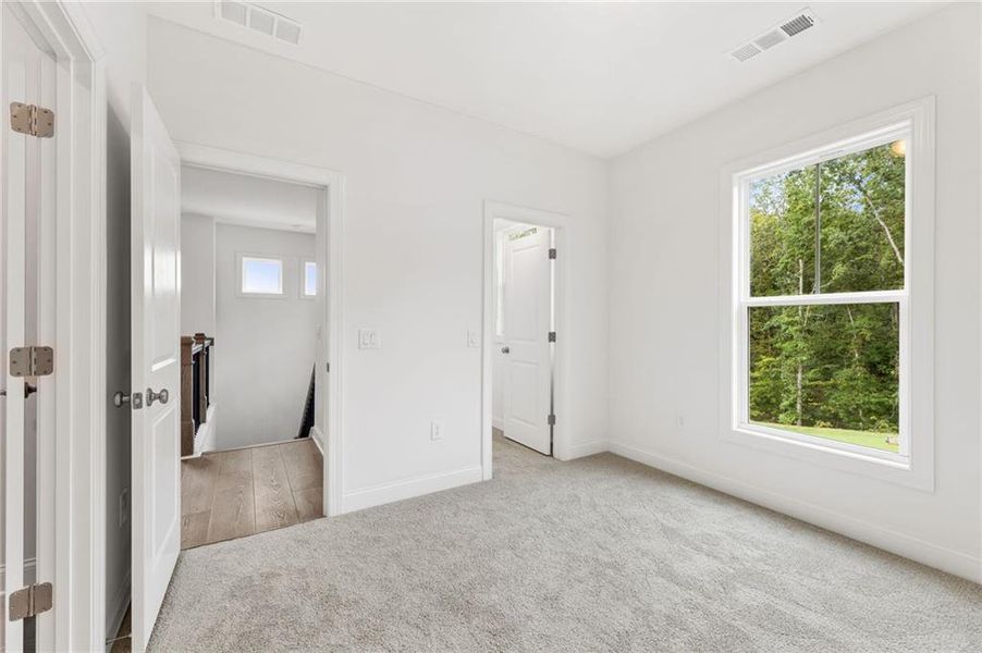 Spacious, unfurnished interior of a new home in Ashbury Commons, Powder Springs (Image 42).