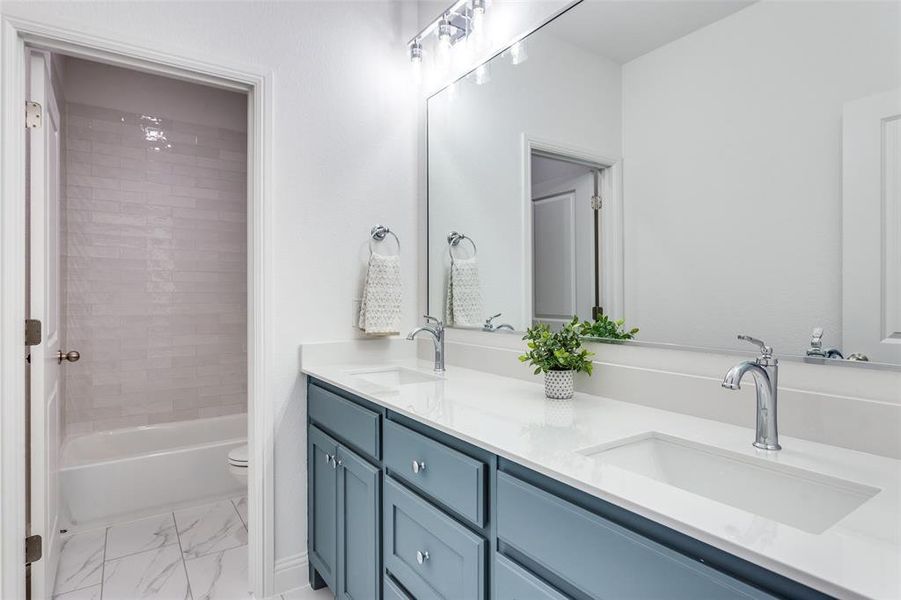 Furnished interior view inside a new home in Reserves at Trinity, Willow Park (Image 9).