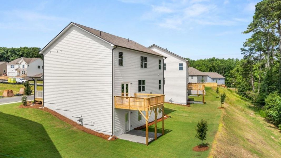 Exterior details and patio area of a home in Liberty Crossing, Braselton (Image 3).