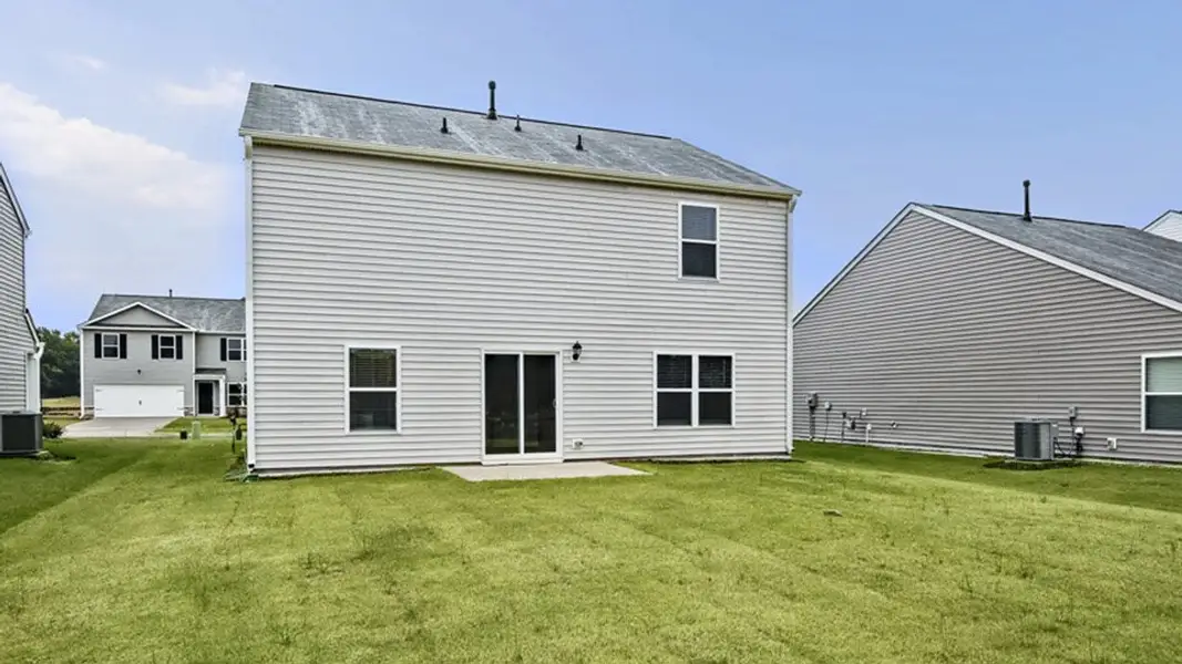 Exterior details and patio area of a home in Wilson's Ridge, Wilson's Mills (Image 3).
