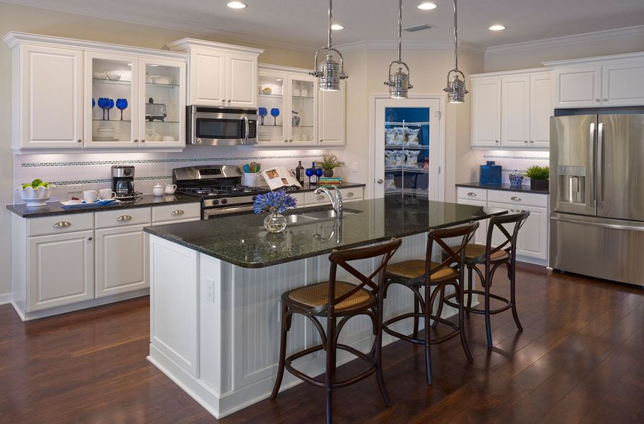 Representative furnished interior of a home built from the Applause by Neal Communities in Verandah, Fort Myers (Image 6).