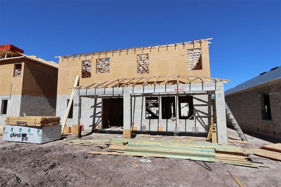 In-progress construction of a new home in Eden at Crossprairie, St. Cloud, FL (Image 16).