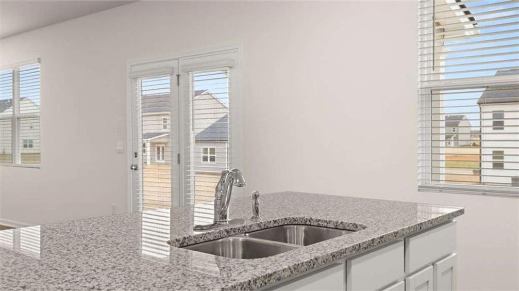 Furnished interior view inside a new home in Preserve at Dove Creek, Statham (Image 8).