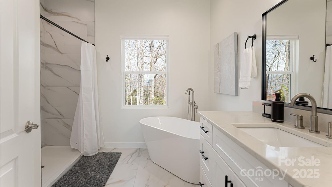 Furnished interior view inside a new home in , Waynesville (Image 9).