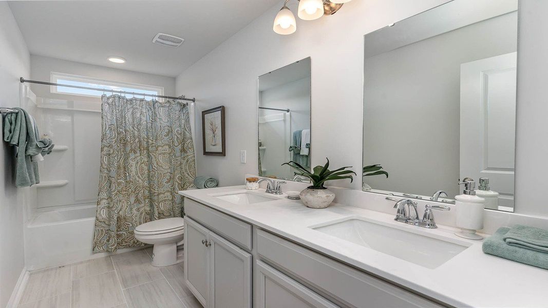 Representative furnished interior of a home built from the Tillman by D.R. Horton in The Preserve at Shaftesbury Glen, Conway (Image 17).