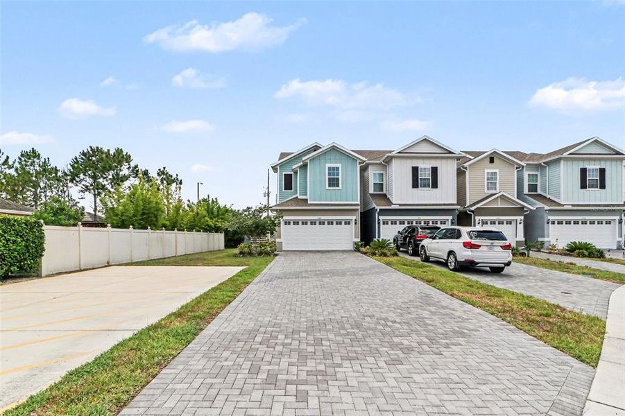Front exterior of a new home in , St. Cloud, FL, highlighting curb appeal (Image 24).