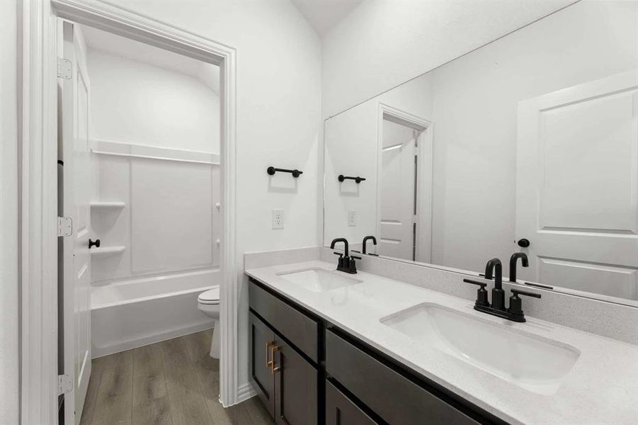 Furnished interior view inside a new home in Creekview Fossil Ridge, Pilot Point (Image 11).