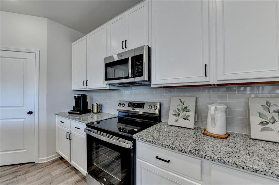 Furnished interior view inside a new home in , Auburn (Image 39).