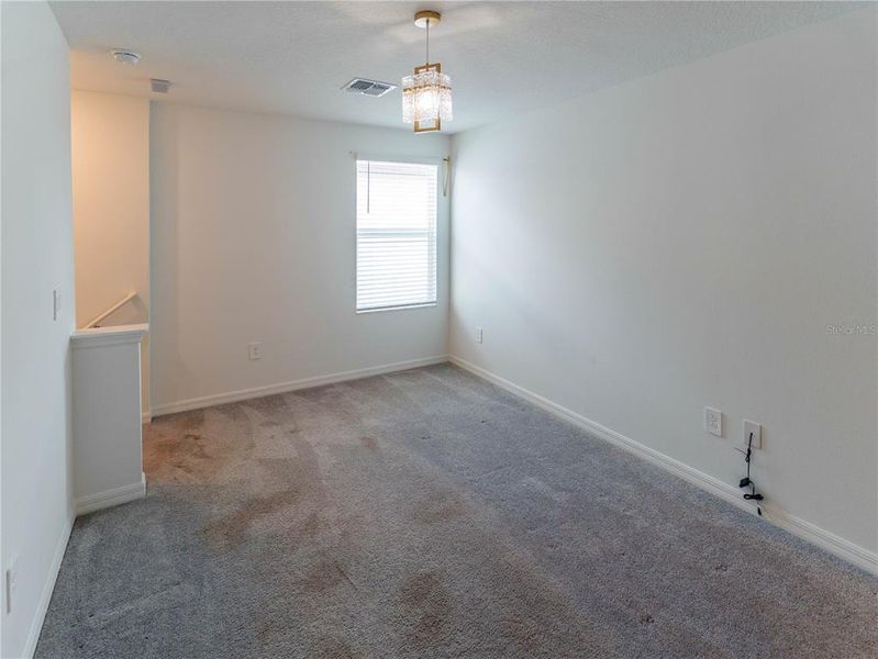 Spacious, unfurnished interior of a new home in The Isle of Avalon, Spring Hill (Image 20).