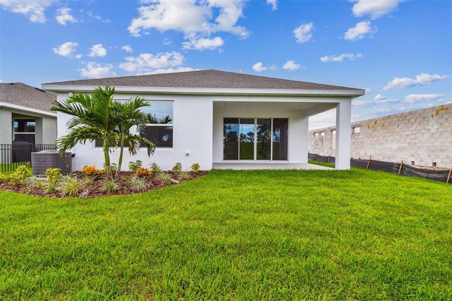 Front exterior of a new home in North River Ranch - Cottage Series, Parrish, FL, highlighting curb appeal (Image 22).