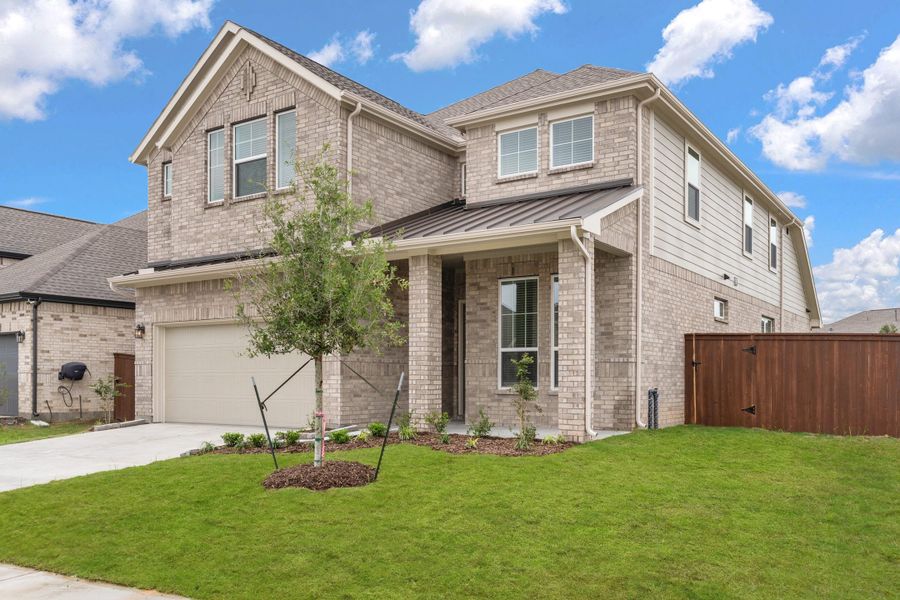 Front exterior of a new home in Brookewater, Rosenberg, TX, highlighting curb appeal (Image 20).