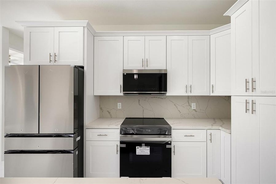 Furnished interior view inside a new home in , Port Charlotte (Image 16).