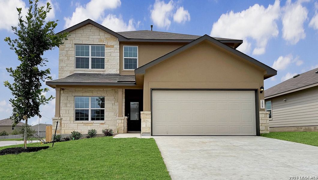 Front exterior of a new home in Redbird Ranch, San Antonio, TX, highlighting curb appeal (Image 2).