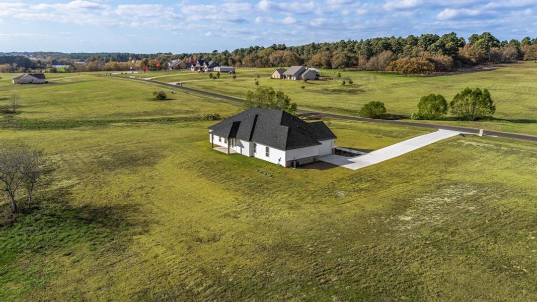 Front exterior of a new home in , Athens, TX, highlighting curb appeal (Image 2). Front exterior of a new home in , Athens, TX, highlighting curb appeal (Image 2).