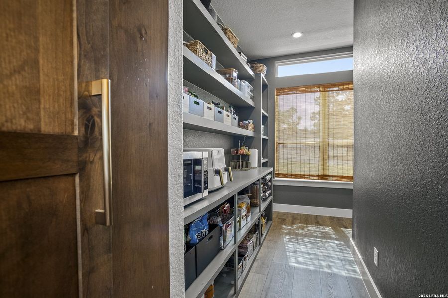 Furnished interior view inside a new home in , Bulverde (Image 26).