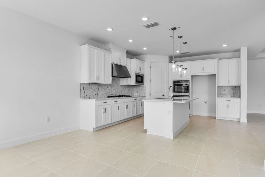 Furnished interior view inside a new home in Ardisia Park, New Smyrna Beach (Image 9).