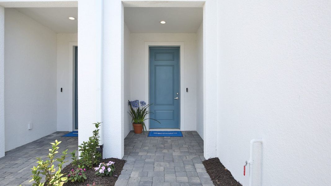 Exterior details and patio area of a home in Palm Grove Real Estate and Homes for Sale in Lakewood Ranch, FL - Neal Communities, Lakewood Ranch (Image 35).