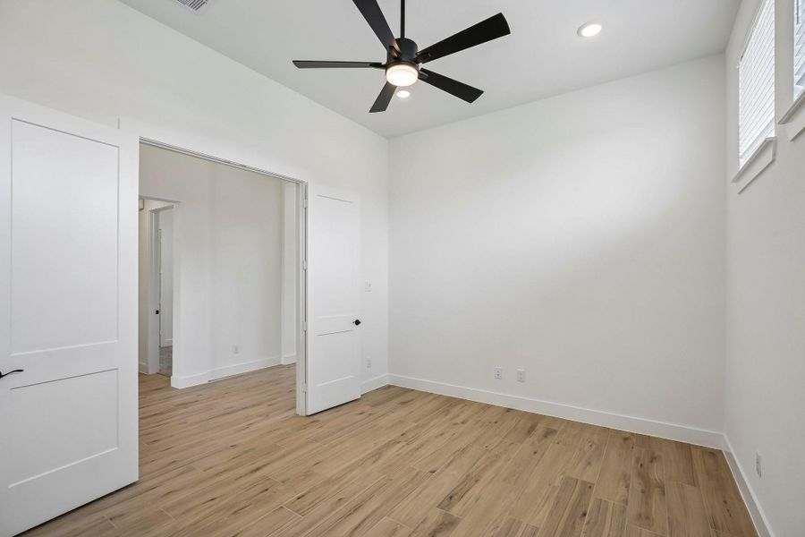 Spacious, unfurnished interior of a new home in Riceland 60',65',70', Old River-Winfree (Image 19).