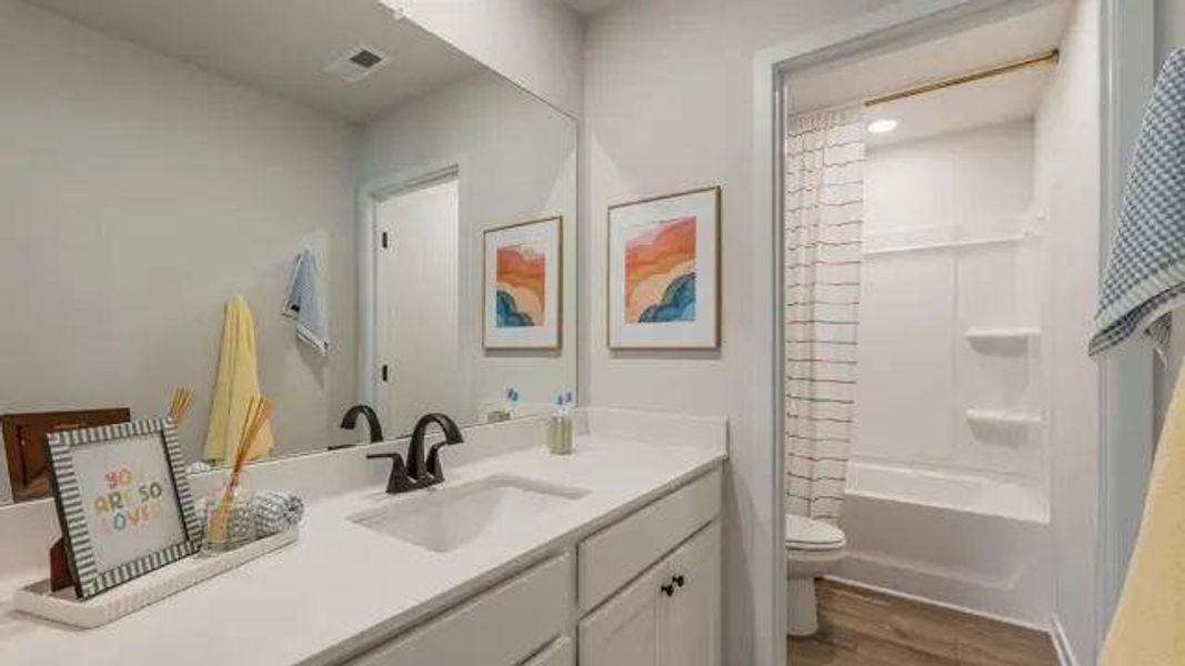 Furnished interior view inside a new home in Reserve at Gum Springs, Jefferson (Image 28).
