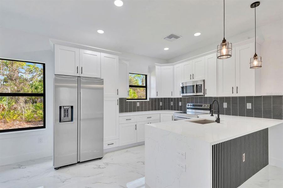 Furnished interior view inside a new home in , Port Charlotte (Image 14). Furnished interior view inside a new home in , Port Charlotte (Image 14).