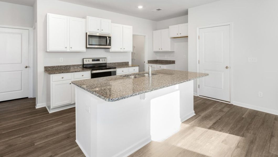 Furnished interior view inside a new home in The Pines at Blake Farm, Wilmington (Image 5).