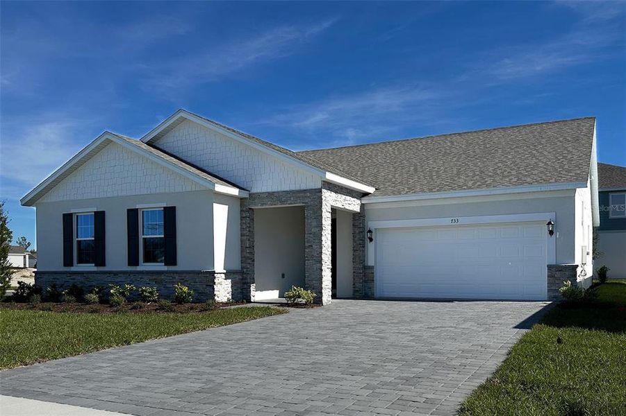 Front exterior of a new home in , Deland, FL, highlighting curb appeal (Image 2). Front exterior of a new home in , Deland, FL, highlighting curb appeal (Image 2).