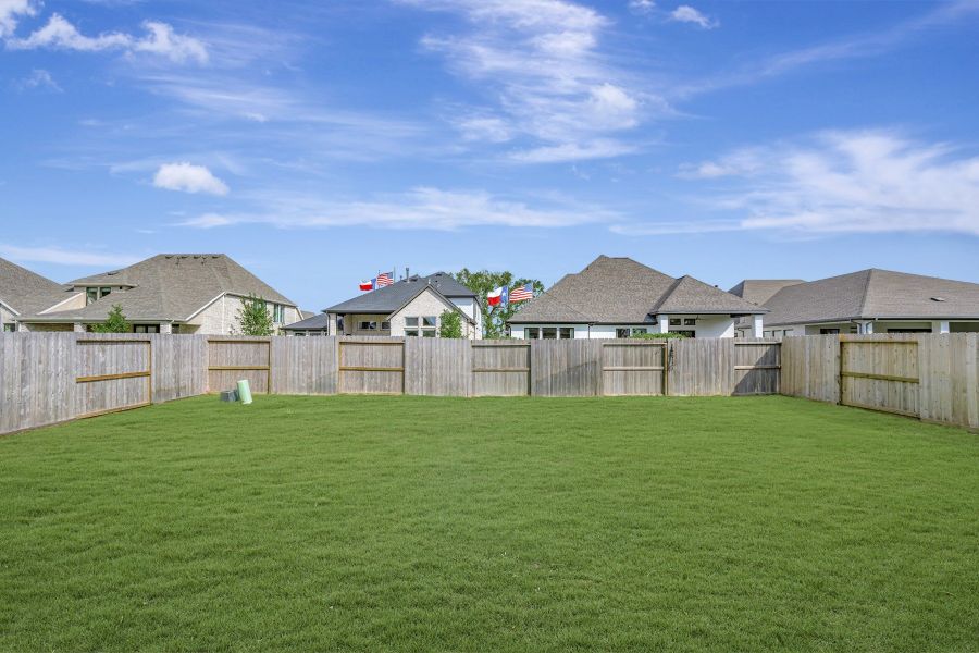 Exterior details and patio area of a home in Riceland - Summit Collection, Mont Belvieu (Image 3).