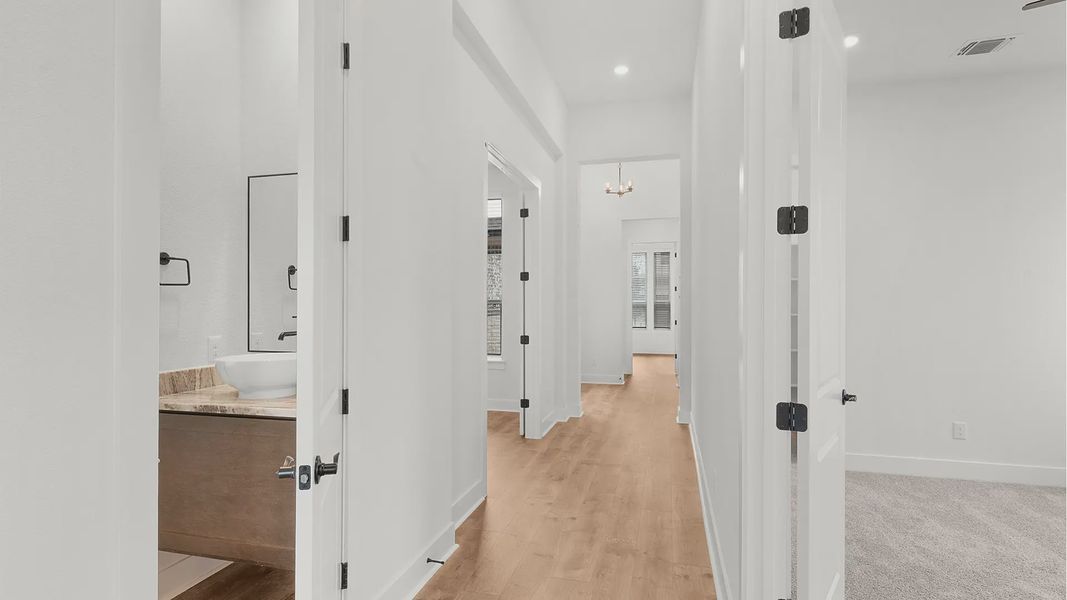Representative unfurnished interior of a home built from the Drios by Chesmar Homes in Berry Creek Highlands, Georgetown (Image 21).