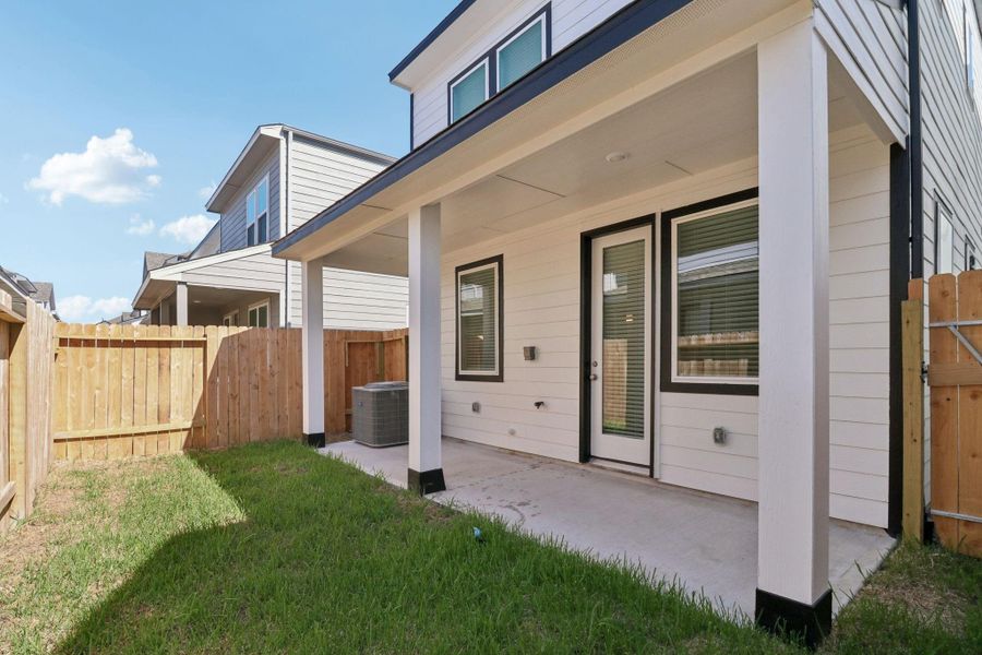 Exterior details and patio area of a home in Spring Brook Village - City Series, Houston (Image 22). Exterior details and patio area of a home in Spring Brook Village - City Series, Houston (Image 22).
