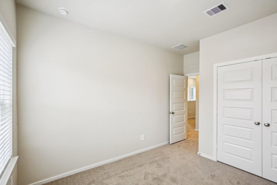 Spacious, unfurnished interior of a new home in Pinewood Trails - City Series, Atascocita (Image 38).