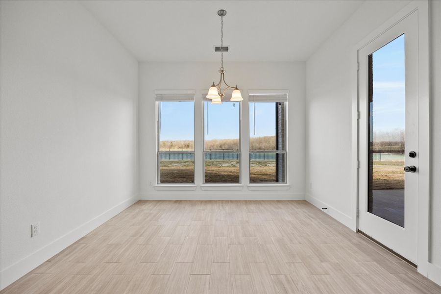 Representative unfurnished interior of a home built from the Davenport by Windsor Homes in Winding Creek, Rockwall (Image 23).